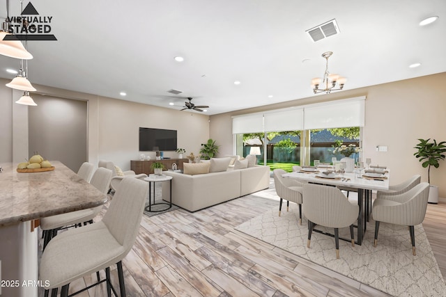1344 N Claiborne, Mesa, AZ 85205 - dining space with a chandelier, light wood-type flooring, recessed lighting, and a ceiling fan