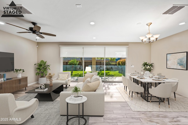 1344 N Claiborne, Mesa, AZ 85205 - living room featuring a chandelier, recessed lighting, and a ceiling fan
