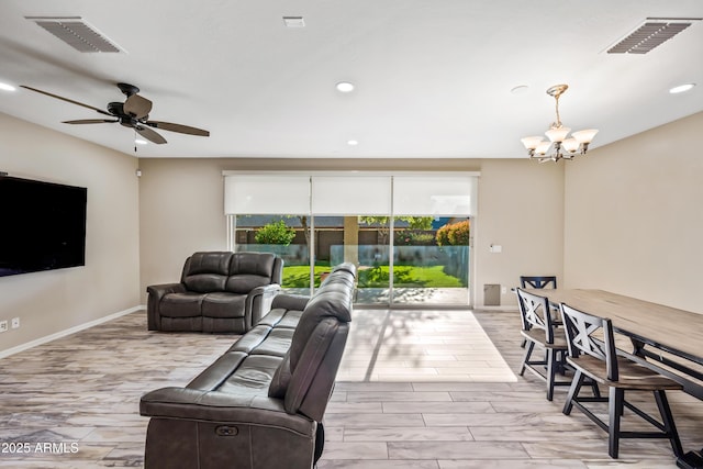 1344 N Claiborne, Mesa, AZ 85205 - living room with a chandelier, ceiling fan, recessed lighting, and baseboards