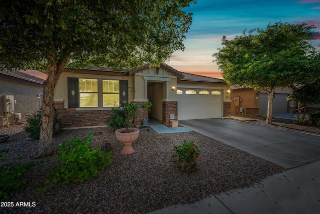 1344 N Claiborne, Mesa, AZ 85205 - single story home with stone siding, an attached garage, stucco siding, and concrete driveway