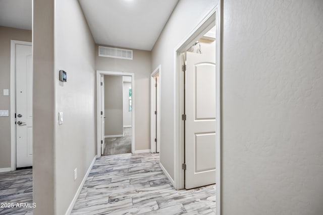 1344 N Claiborne, Mesa, AZ 85205 - hall featuring baseboards and light wood-style flooring