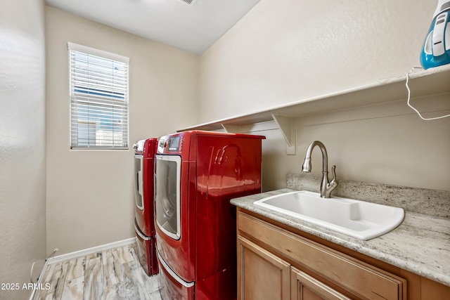 1344 N Claiborne, Mesa, AZ 85205 - laundry area featuring washing machine and dryer, baseboards, and cabinet space