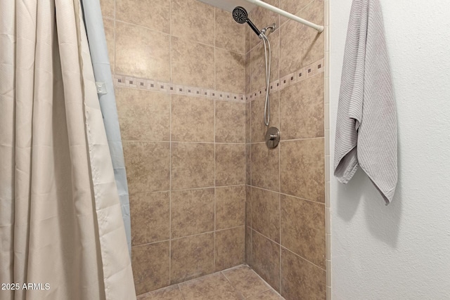 bathroom with curtained shower