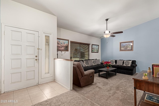 tiled living room with ceiling fan