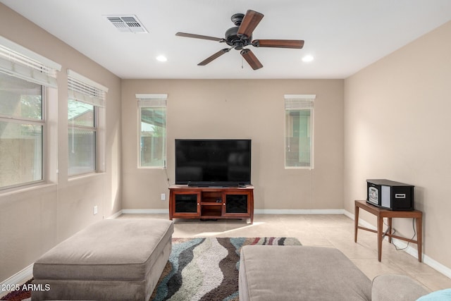 living area featuring visible vents, baseboards, light tile patterned flooring, recessed lighting, and ceiling fan