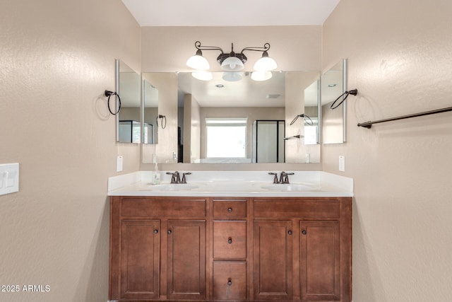 full bath featuring a sink and double vanity