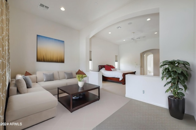 bedroom featuring light carpet