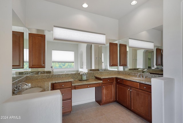 interior space with tile patterned floors and vanity