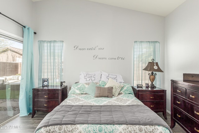 bedroom with wood finished floors