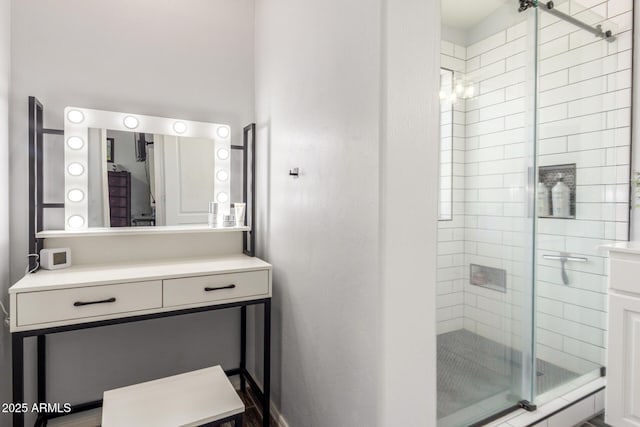 full bath featuring a stall shower and vanity