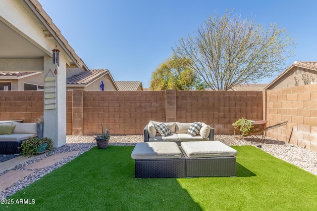 view of yard featuring a fenced backyard and an outdoor living space