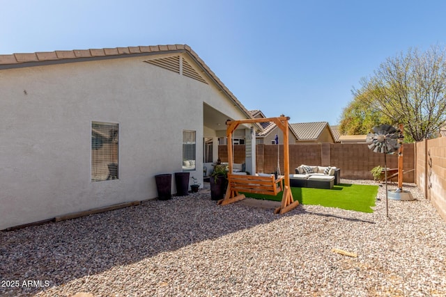 view of yard featuring an outdoor hangout area, a patio area, and a fenced backyard