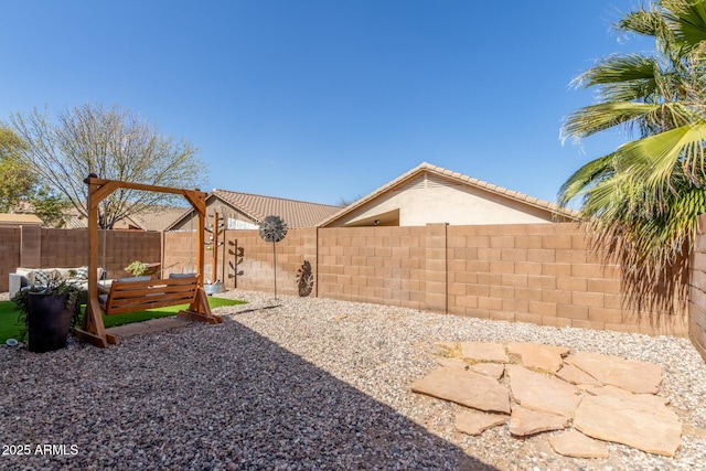 view of yard featuring a patio and a fenced backyard