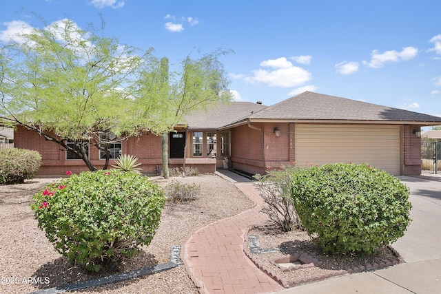 1334 S Glenview Cir, Mesa, AZ 85204 - ranch-style home with brick siding, an attached garage, driveway, and a shingled roof