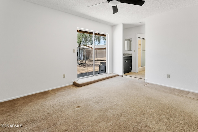 1334 S Glenview Cir, Mesa, AZ 85204 - empty room featuring light carpet, a ceiling fan, a textured ceiling, and baseboards
