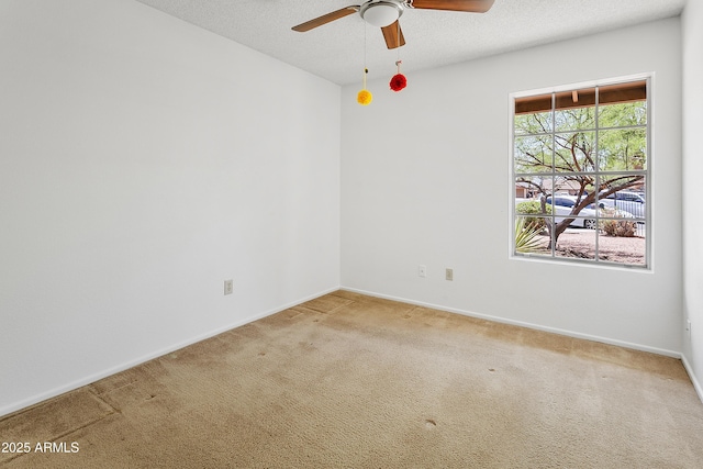 1334 S Glenview Cir, Mesa, AZ 85204 - empty room with ceiling fan, light carpet, baseboards, and a textured ceiling