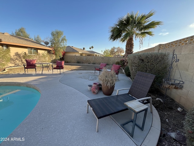 view of patio / terrace featuring a fenced in pool