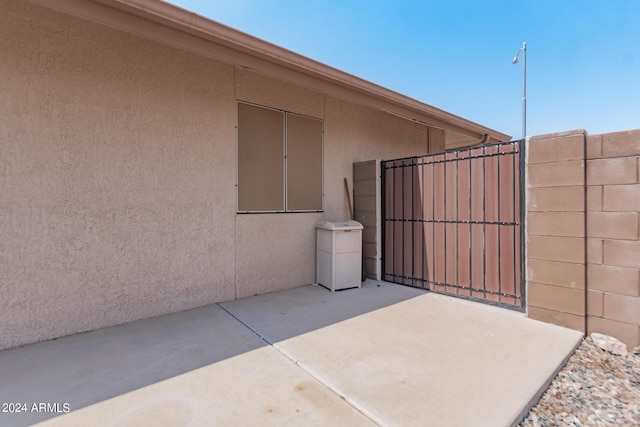 view of patio / terrace with a gate