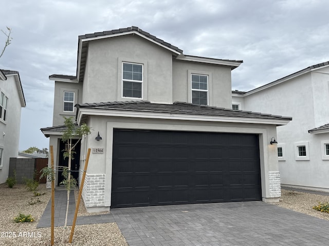 1530 N Pueblo Dr, Apache Junction, AZ 85120 - traditional-style house featuring driveway, an attached garage, stucco siding, and a tiled roof