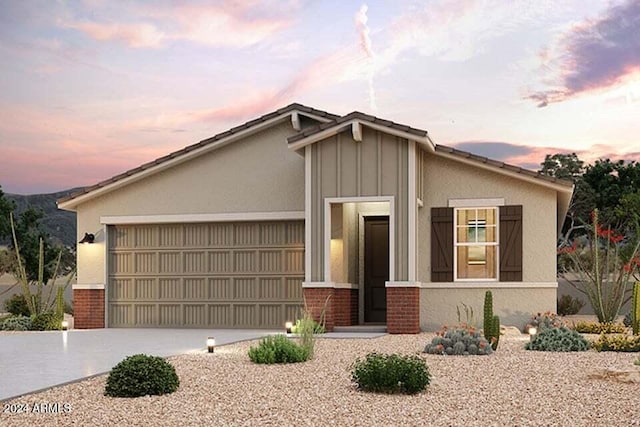 view of front of home with a garage