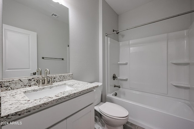 full bathroom with bathing tub / shower combination, vanity, and toilet