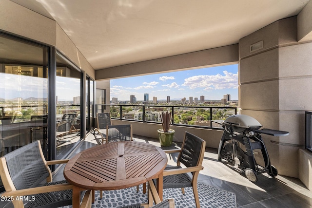 balcony featuring a view of city
