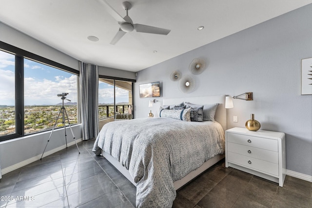bedroom featuring baseboards, access to outside, dark tile patterned floors, and ceiling fan