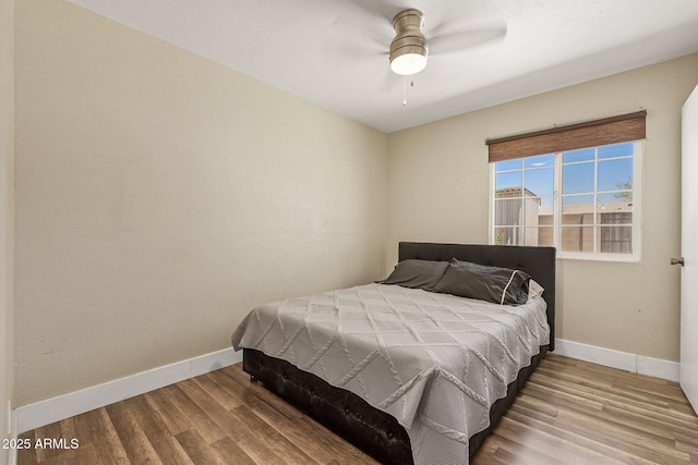11450 E Elton Ave, Mesa, AZ 85208 - bedroom with wood finished floors and ceiling fan