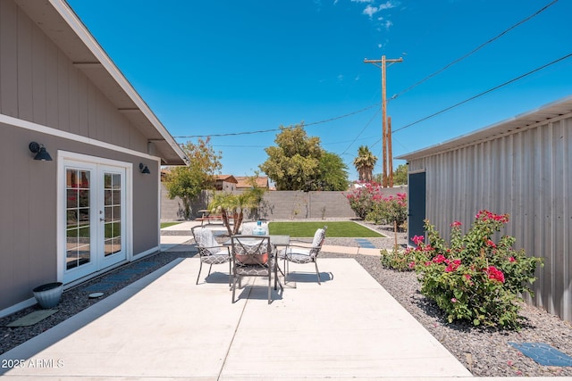 11450 E Elton Ave, Mesa, AZ 85208 - fenced backyard with outdoor dining area, a patio area, and french doors