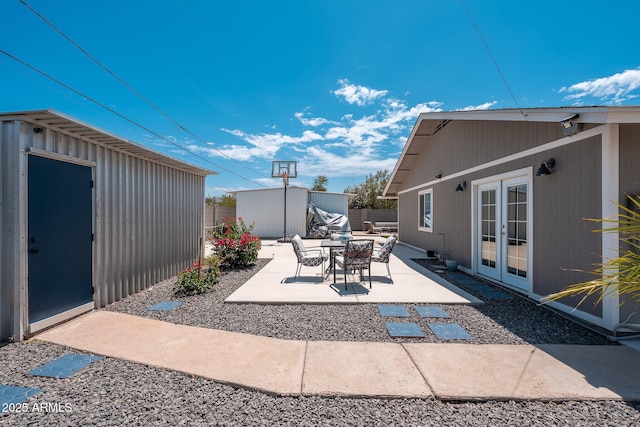 11450 E Elton Ave, Mesa, AZ 85208 - view of patio / terrace with french doors and a storage unit