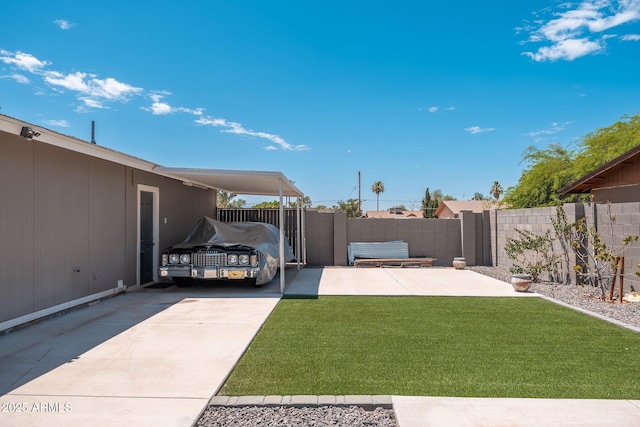 11450 E Elton Ave, Mesa, AZ 85208 - view of yard with concrete driveway and an attached carport