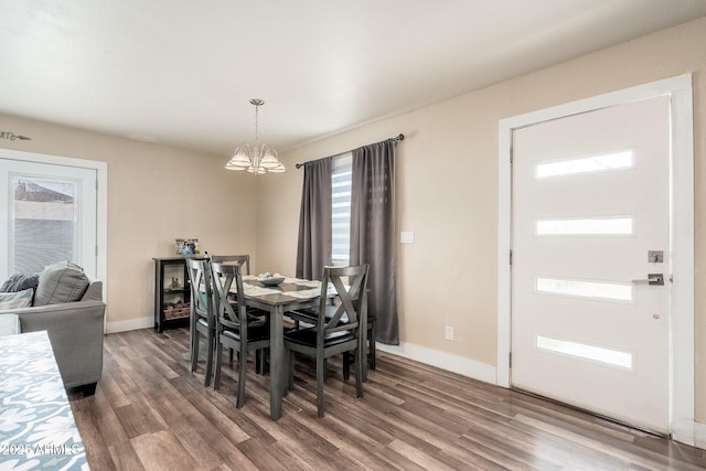 11450 E Elton Ave, Mesa, AZ 85208 - dining room featuring a chandelier and wood finished floors