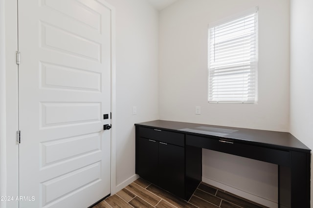 interior space featuring dark hardwood / wood-style floors and a wealth of natural light