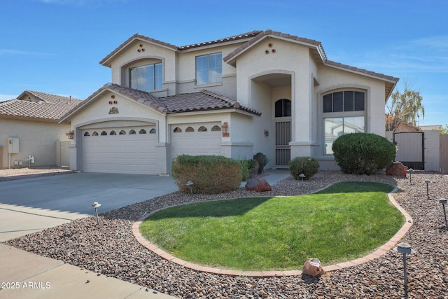 view of front of property with a garage and a front yard