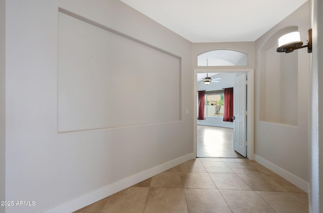 hallway with light tile patterned floors