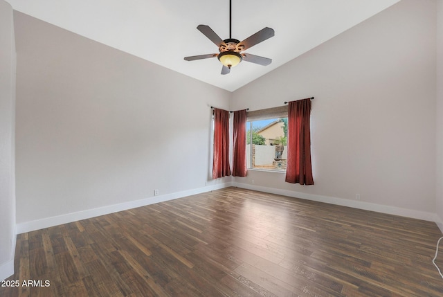 spare room with vaulted ceiling, ceiling fan, and dark hardwood / wood-style flooring