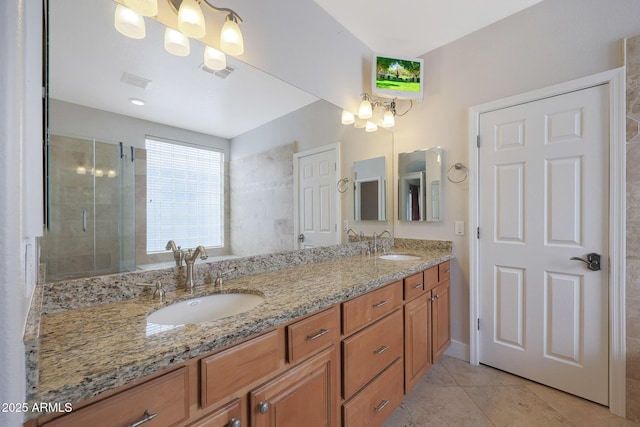 bathroom with vanity, tile patterned floors, and walk in shower