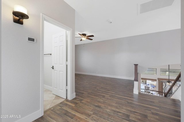 interior space with hardwood / wood-style floors and ceiling fan