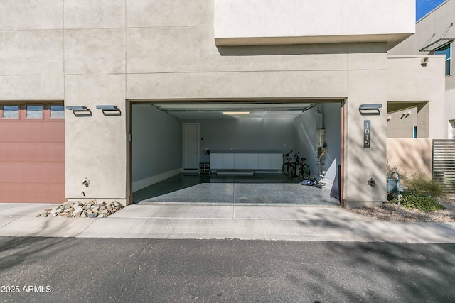 property entrance with a garage