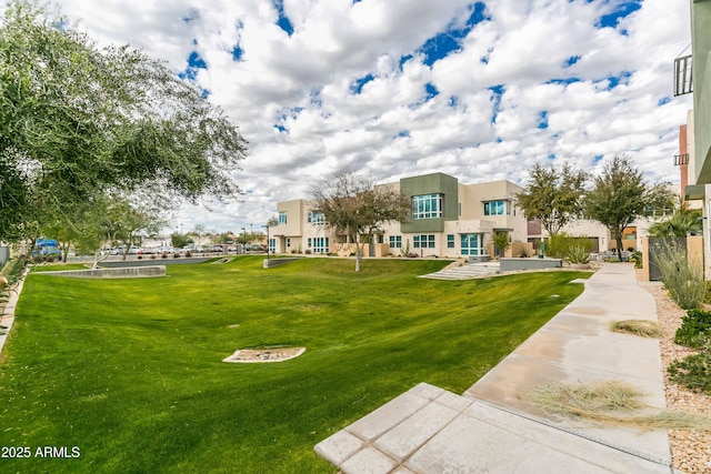 view of community with a lawn