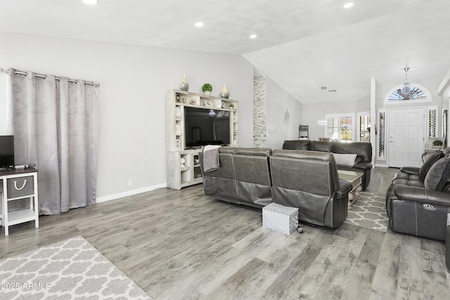 1015 E Paradise Ln, Phoenix, AZ 85022 - living room with lofted ceiling, wood finished floors, and recessed lighting