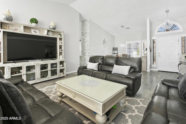 1015 E Paradise Ln, Phoenix, AZ 85022 - living area with vaulted ceiling and wood finished floors