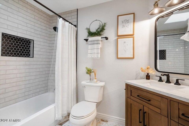 full bathroom featuring vanity, toilet, and shower / bath combo with shower curtain