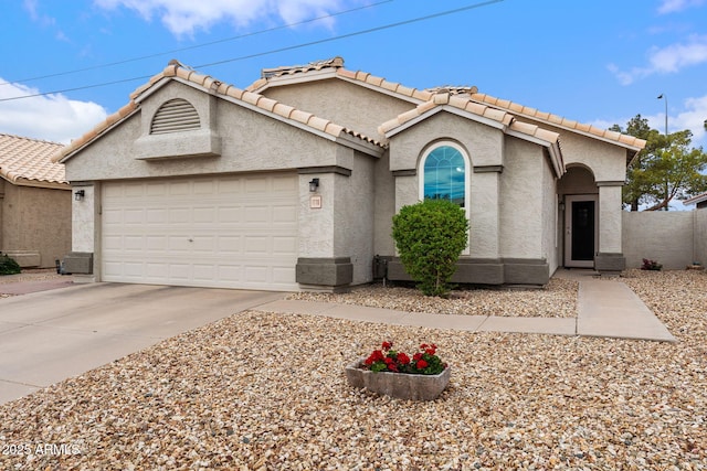 1770 W Derringer Way, Chandler, AZ 85286 - view of front of property featuring an attached garage, stucco siding, driveway, and a tile roof