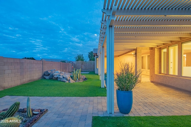 view of patio featuring a fenced backyard and a pergola