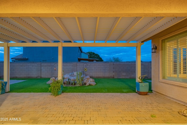 view of patio featuring a pergola and a fenced backyard