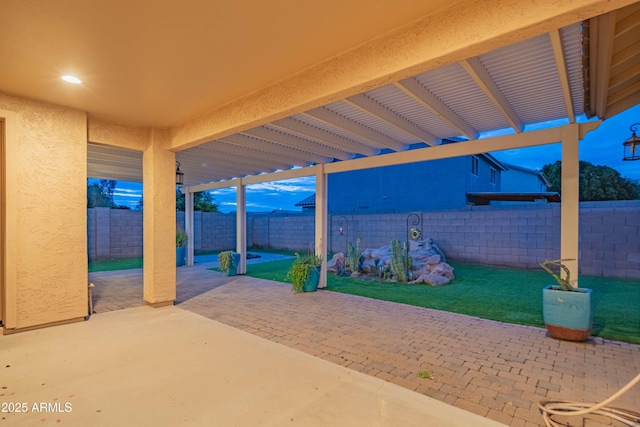 view of patio / terrace featuring a fenced backyard and a pergola