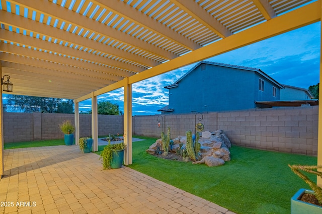 view of patio featuring a pergola and a fenced backyard