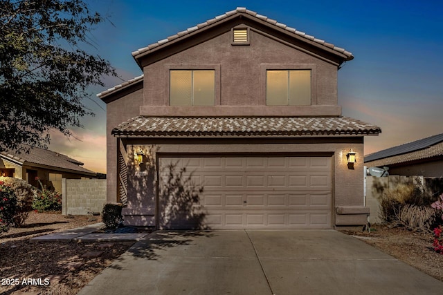 view of front of house with a garage