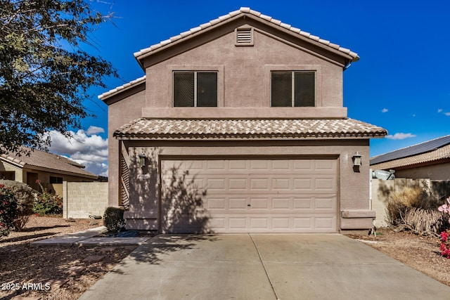 view of front of property featuring a garage